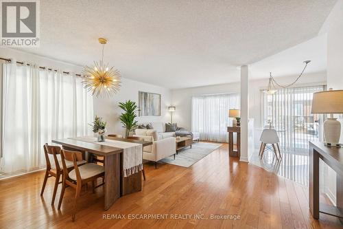 Open concept dining and living area - 245 Centennial Forest Drive, Milton, ON - Indoor Photo Showing Dining Room