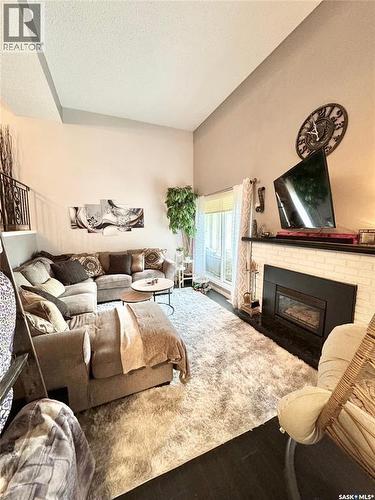 1908 3Rd Avenue E, Prince Albert, SK - Indoor Photo Showing Bedroom With Fireplace
