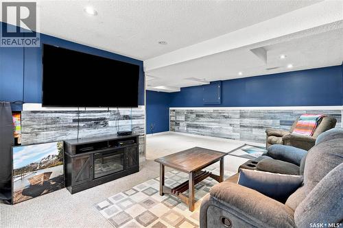 130 6Th Street, Pilot Butte, SK - Indoor Photo Showing Living Room With Fireplace