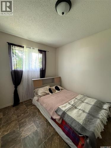 504 4Th Street W, Wilkie, SK - Indoor Photo Showing Bedroom