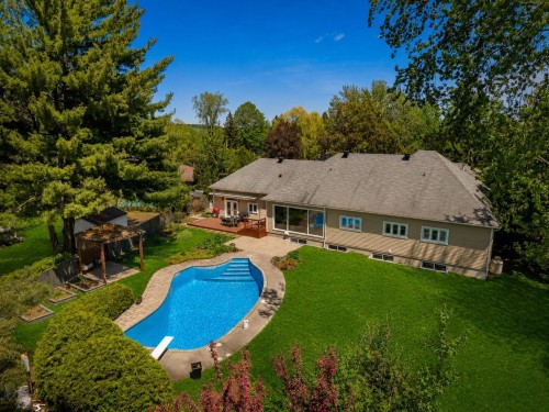 Courtyard - 349 Rue Montclair, Rosemère, QC - Outdoor With In Ground Pool With Backyard