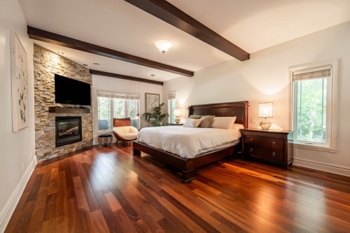 Master Bedroom - 349 Rue Montclair, Rosemère, QC - Indoor Photo Showing Bedroom With Fireplace