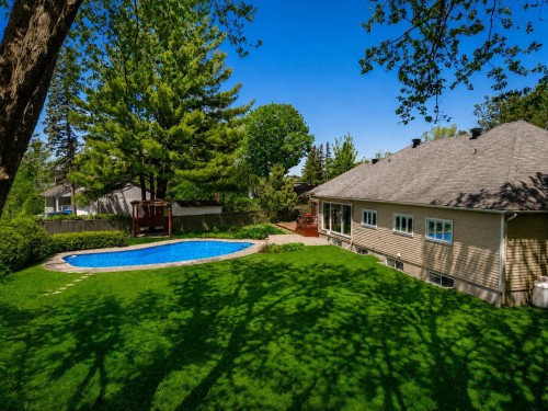 Courtyard - 349 Rue Montclair, Rosemère, QC - Outdoor With In Ground Pool With Backyard