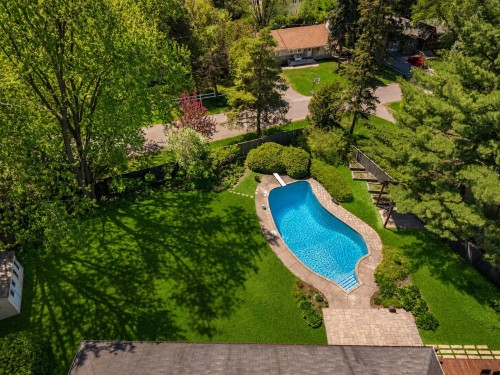 Courtyard - 349 Rue Montclair, Rosemère, QC - Outdoor With In Ground Pool