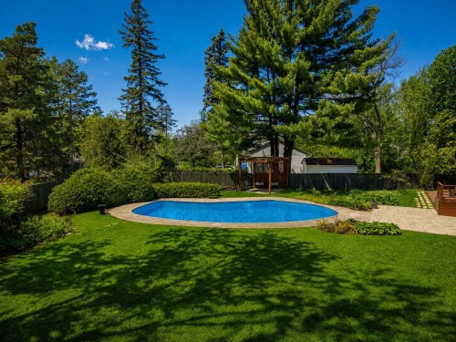 Courtyard - 349 Rue Montclair, Rosemère, QC - Outdoor With In Ground Pool With Backyard