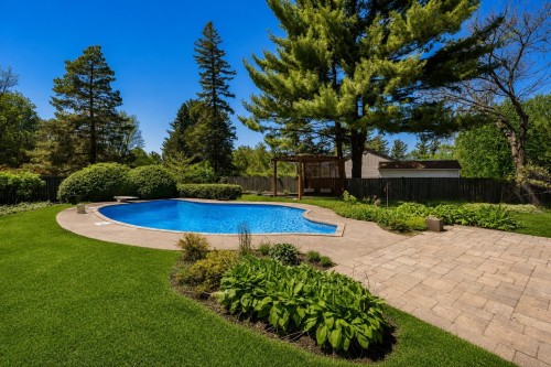 Courtyard - 349 Rue Montclair, Rosemère, QC - Outdoor With In Ground Pool With Backyard