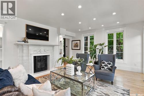 100 Poplar Crescent, Saskatoon, SK - Indoor Photo Showing Living Room With Fireplace