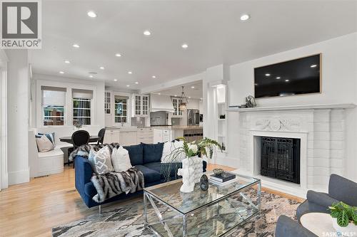 100 Poplar Crescent, Saskatoon, SK - Indoor Photo Showing Living Room With Fireplace