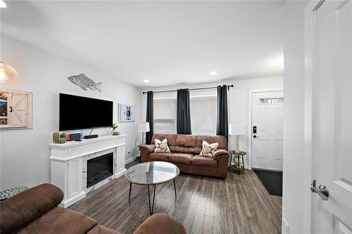 5 740 Traverse Road, Ste Anne, MB - Indoor Photo Showing Living Room With Fireplace