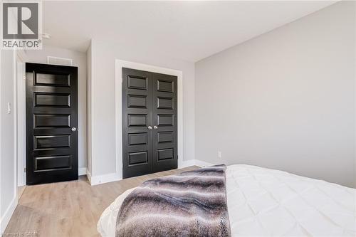 Bedroom featuring a closet and light wood-type flooring - 239 Cranbrook Street, Kitchener, ON - Indoor Photo Showing Bedroom