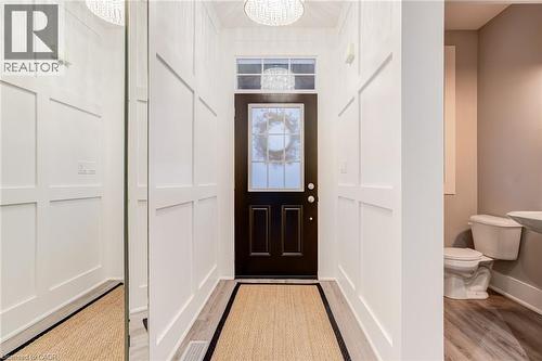 Entryway featuring light wood-style flooring and hanging lights - 239 Cranbrook Street, Kitchener, ON - Indoor Photo Showing Other Room