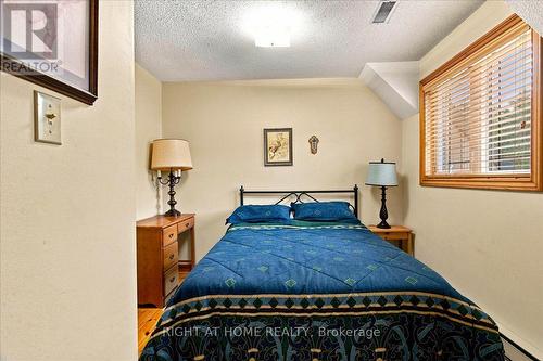 12 James Street, Tiny, ON - Indoor Photo Showing Bedroom