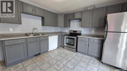 1715 Fleet Street, Regina, SK - Indoor Photo Showing Kitchen With Double Sink