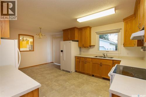 141 19Th Street, Battleford, SK - Indoor Photo Showing Kitchen With Double Sink