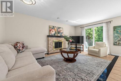 7 Chipstead Road, Toronto, ON - Indoor Photo Showing Living Room With Fireplace