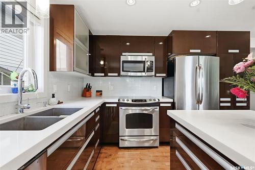 411 Hartley Road, Saskatoon, SK - Indoor Photo Showing Kitchen With Double Sink With Upgraded Kitchen