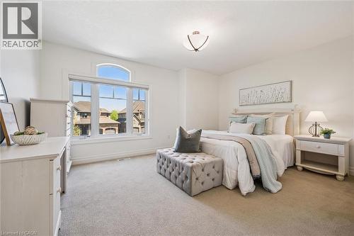 Bright bedroom with large window. - 828 Copper Ridge Drive, Waterloo, ON - Indoor Photo Showing Bedroom