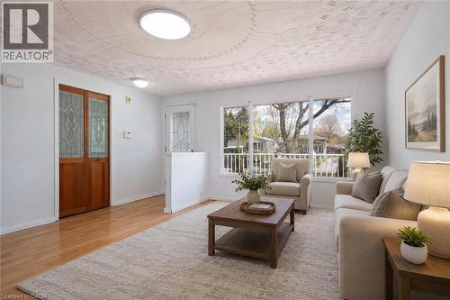 Virtually Staged - 87 Christopher Drive, Waterloo, ON - Indoor Photo Showing Living Room