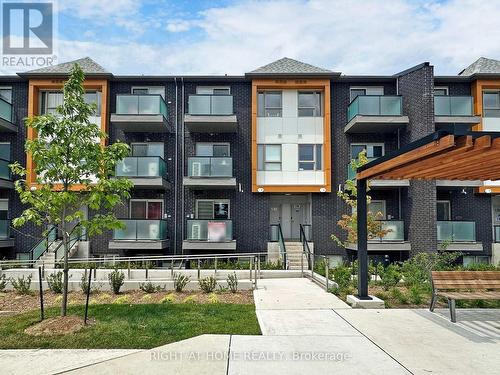 129 - 1081 Danforth Road, Toronto, ON - Outdoor With Balcony With Facade