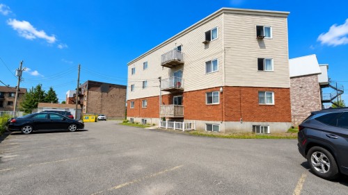 Back of Structure - 110-5 Crois. De L'Oranger, Saint-Constant, QC - Outdoor With Exterior