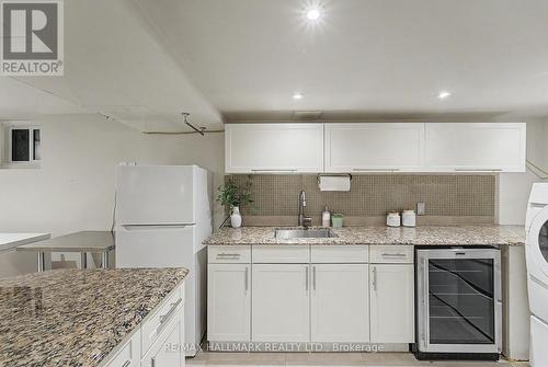 basement kitchen with b/i bar fridge - 52 Colonel Danforth Trail, Toronto, ON 