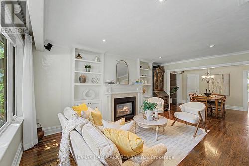 Elegant living rm custom built-in/FP and hardwood - 52 Colonel Danforth Trail, Toronto, ON 