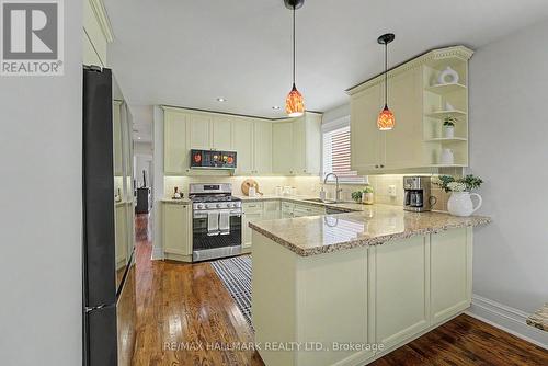 chefs kitchen! SS appliances Pot lights - 52 Colonel Danforth Trail, Toronto, ON 
