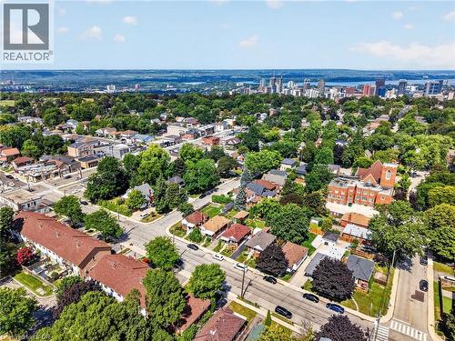 Established neighborhood setting with mature trees and a distant cityscape - 43 E Brucedale Avenue E, Hamilton, ON 