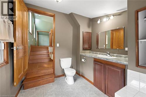 Functional bathroom with a vanity, integrated sink, and overhead lighting - 5480 Line 42 Line, Mitchell, ON 