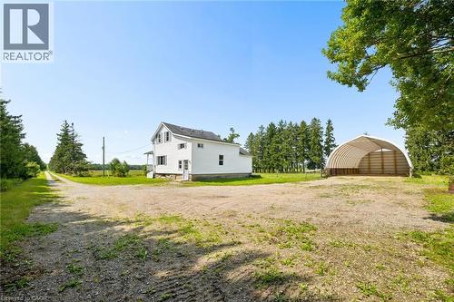 White two-story residence with a covered porch - 5480 Line 42 Line, Mitchell, ON 