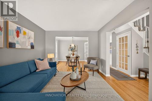 Living room - view of door to lower level at right - 2545 Page Road, Ottawa, ON 