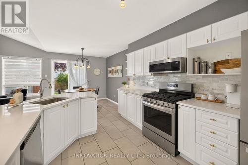 Open concept kitchen with gas stove - 2545 Page Road, Ottawa, ON 