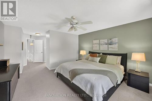 Primary bedroom with walk-in closet & ensuite bath - 2545 Page Road, Ottawa, ON 