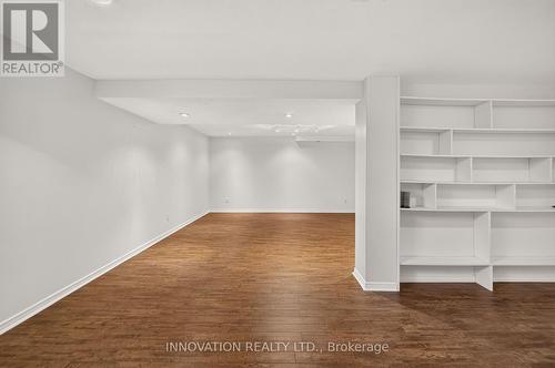 Lower level recreation room with built-in shelving - 2545 Page Road, Ottawa, ON 