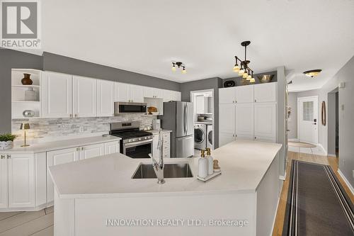 Open-concept kitchen with quartz countertop - 2545 Page Road, Ottawa, ON 