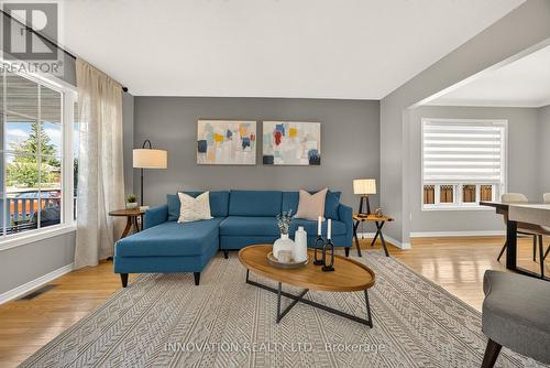 Living room - view of porch/terrace at left - 2545 Page Road, Ottawa, ON 