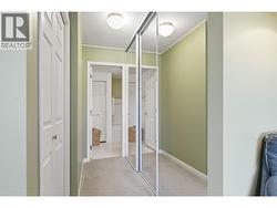 Large closet featuring built-in shelving, additional linen storage - 