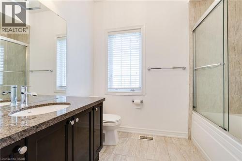 Vanity with stone countertop, undermount sink, and chrome faucet - 2 Hawstone Road, Vellore, ON 