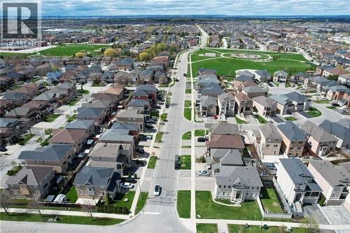 Residential street with paved roads, concrete sidewalks, and manicured lawns - 2 Hawstone Road, Vellore, ON 