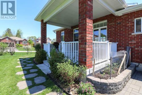 COVERED DECK OFF KITCHEN - 936 Jordeli Lane, Midland, ON 