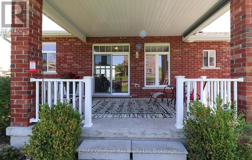 COVERED DECK OFF KITCHEN - 936 Jordeli Lane, Midland, ON 