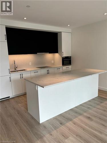 741 KING Street W Unit# 104 , Kitchener, Ontario N2G 1E5 2
