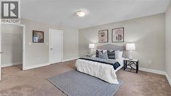 Neutral-toned walls complement the brown carpeting - 