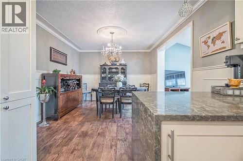 View of the dining room from the kitchen. - 115 Southwood Drive, Cambridge, ON 
