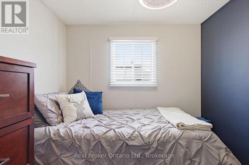 first bedroom - 428 Pine Pass, Centre Wellington, ON 