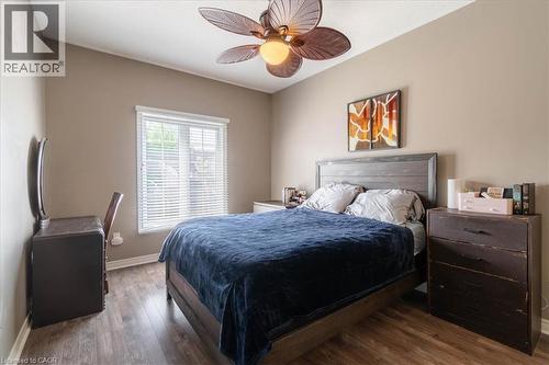 Main Floor Primary Bedroom with en suite bathroom and his and hers closet - 20 Millcroft Drive, Simcoe, ON 