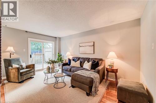 Recessed lighting, light-toned wall paint, and wood-finish flooring - 360 Cornridge Place Unit# 2, Waterloo, ON 