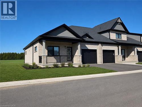 AI-enhanced image for illustration purposes. Depicts an existing Falcon home. Actual home to be built, landscaping, surroundings, colours and finishes may vary. - 121 Barn Owl Way, Simcoe, ON 