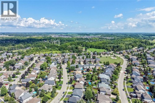 Residential development with established homes, paved streets, varied rooflines, and mature landscaping - 10 Balvenie Boulevard, Caledonia, ON 