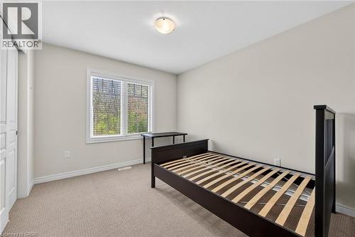 Recessed lighting, light-colored walls, carpeted flooring, and a large window with blinds - 9 Winterberry Boulevard, Thorold, ON 